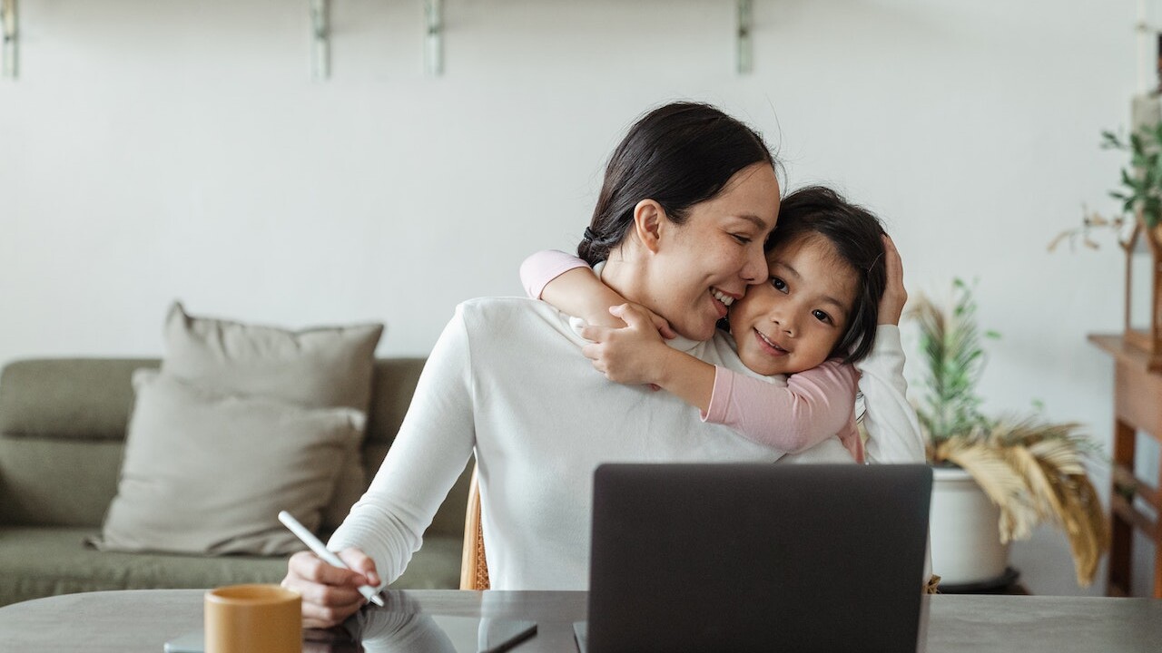 Mom and Daughter Working